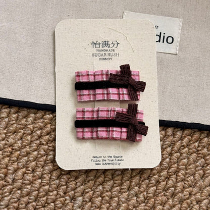 粉色格紋蝴蝶結髮夾－粉白對夾款細節｜https://igowo.tw/