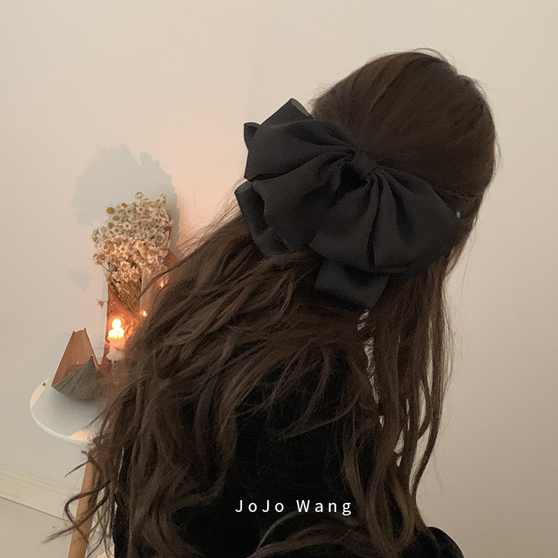 黑色蝴蝶結髮夾－商品主圖｜https://igowo.tw/