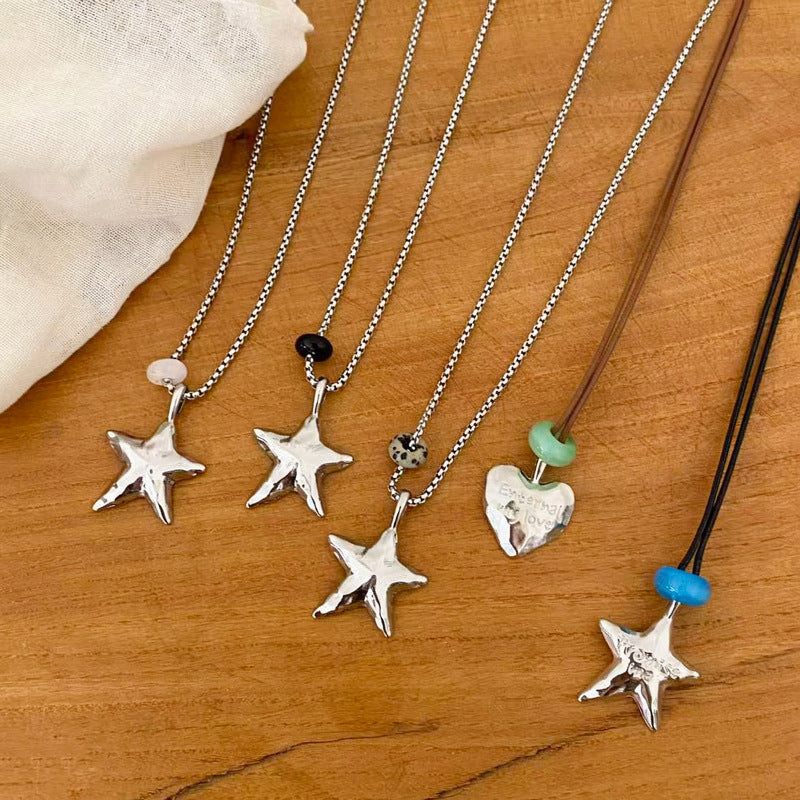 星星簡約項鍊－項鍊-銀色-黑曜石-星星款實拍｜https://igowo.tw/