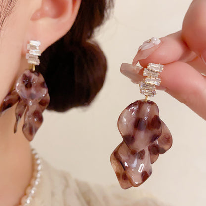 鋯石豹紋花朵流蘇耳墜－商品主圖｜https://igowo.tw/