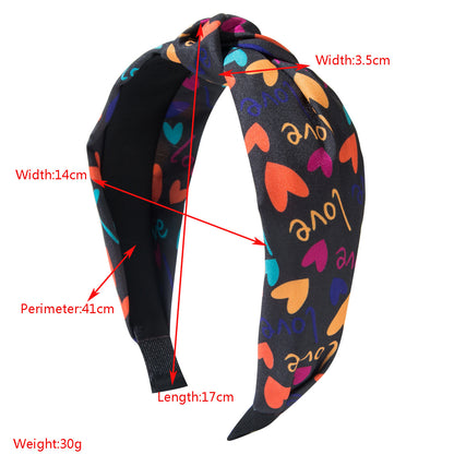 布面愛心扭結髮箍－紅心款實拍｜https://igowo.tw/
