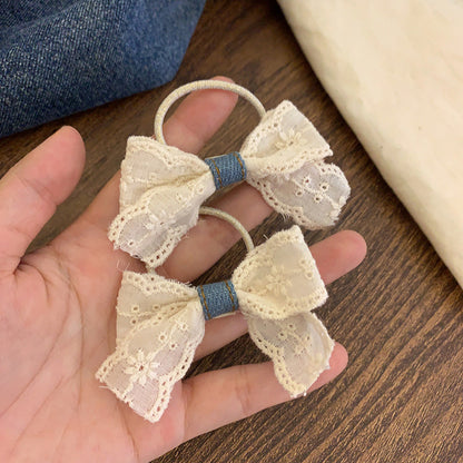 蕾絲蝴蝶結髮夾－牛仔蝴蝶結對夾款細節｜https://igowo.tw/