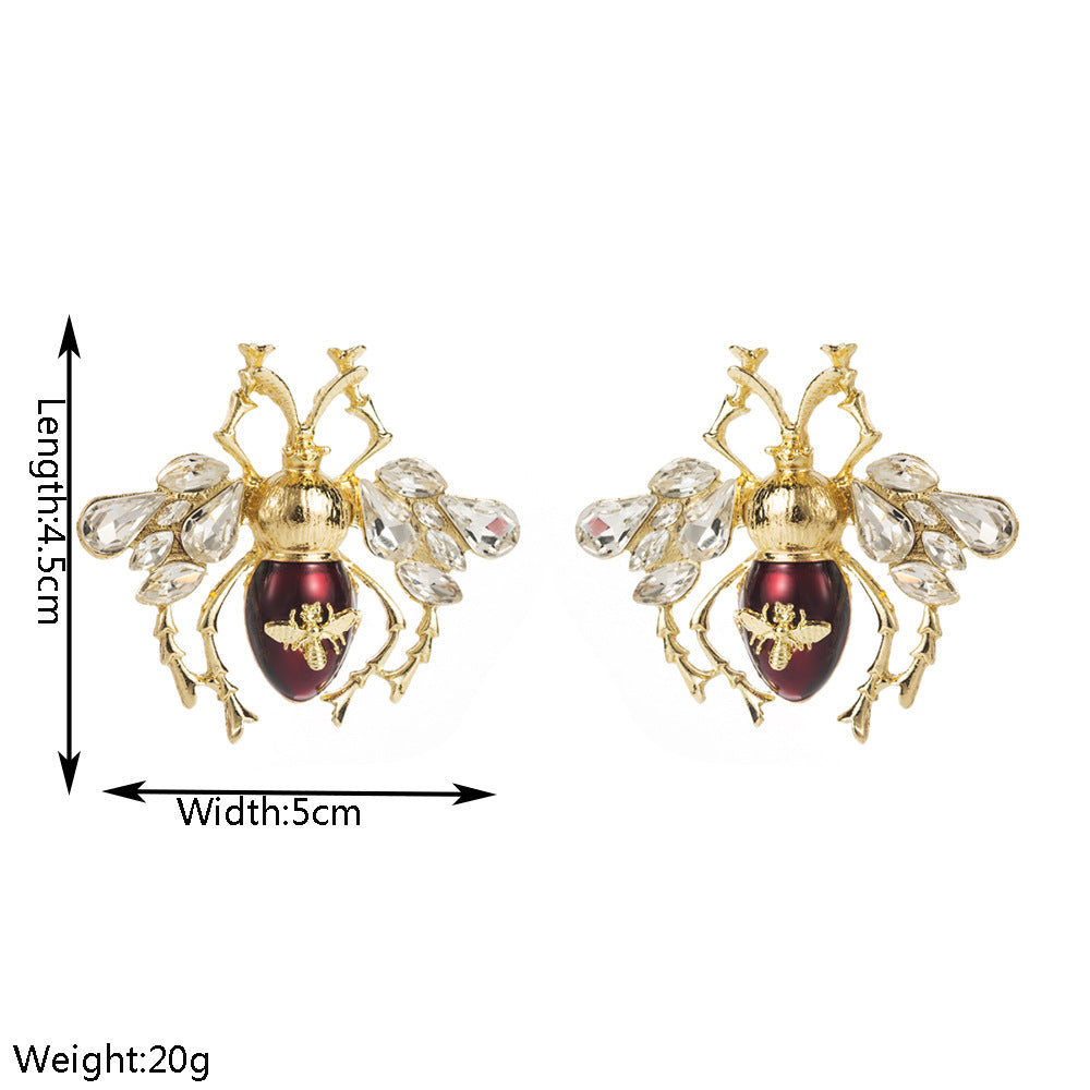 S925琺瑯蜜蜂鑲鑽耳環－銀魚刺款實拍｜https://igowo.tw/