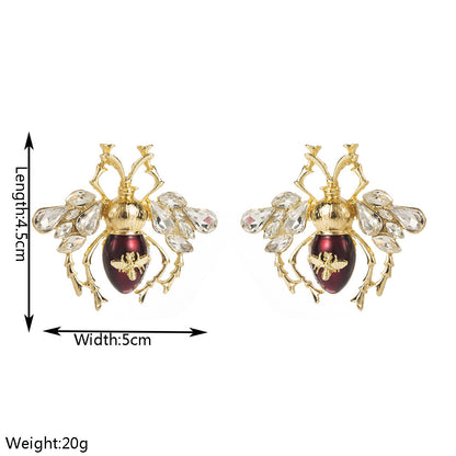 S925琺瑯蜜蜂鑲鑽耳環－銀魚刺款實拍｜https://igowo.tw/