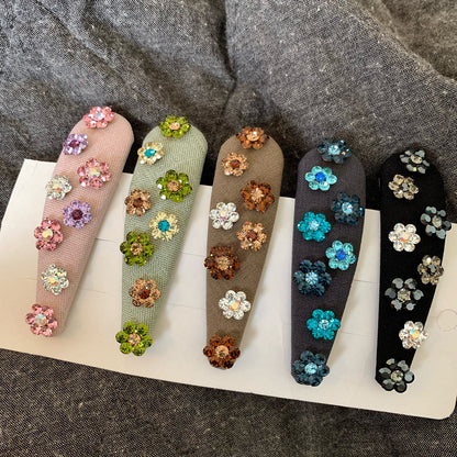 水晶鋯石花朵水滴髮夾－商品主圖｜https://igowo.tw/