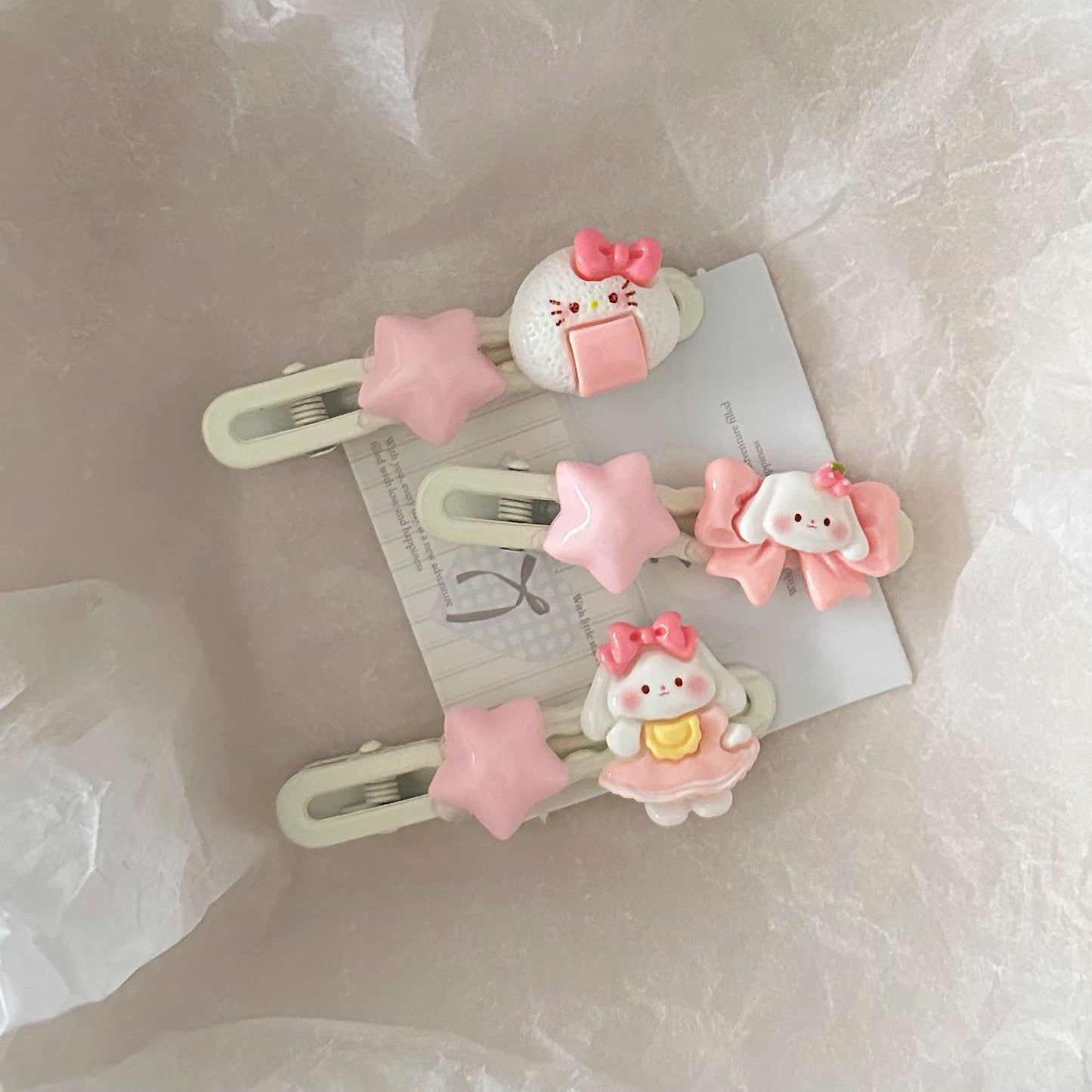 粉色貓咪蝴蝶結髮夾－商品主圖｜https://igowo.tw/