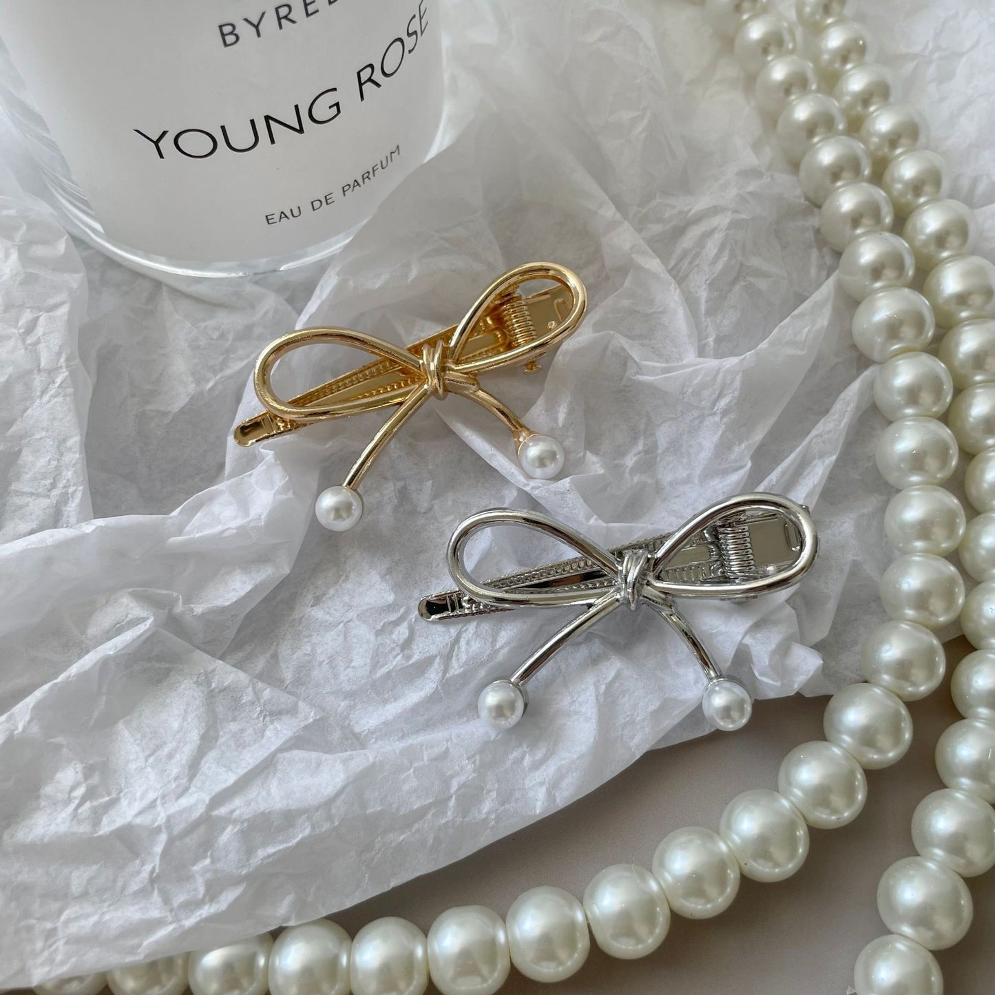 珍珠蝴蝶結簡約髮夾－商品主圖｜https://igowo.tw/