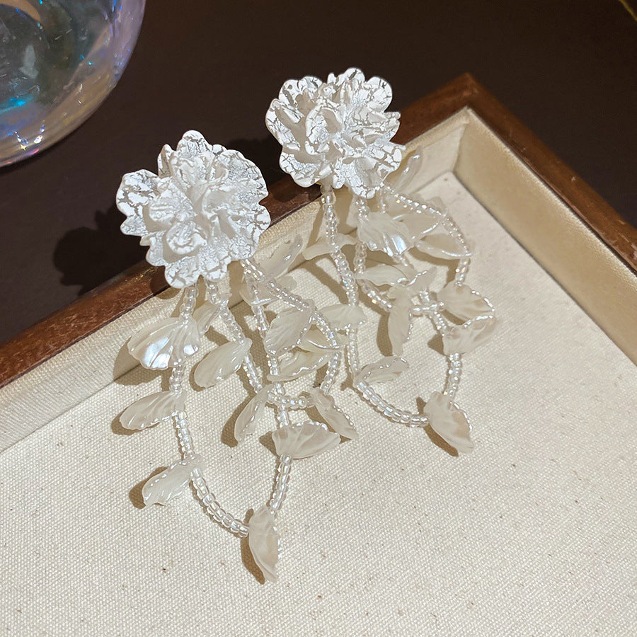 珍珠銀針花朵鑲鑽耳釘
