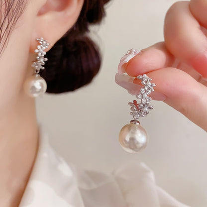 S925珍珠花朵耳墜－商品主圖｜https://igowo.tw/