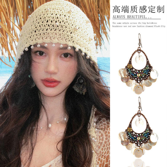 貝殼流蘇長版耳環－商品主圖｜https://igowo.tw/