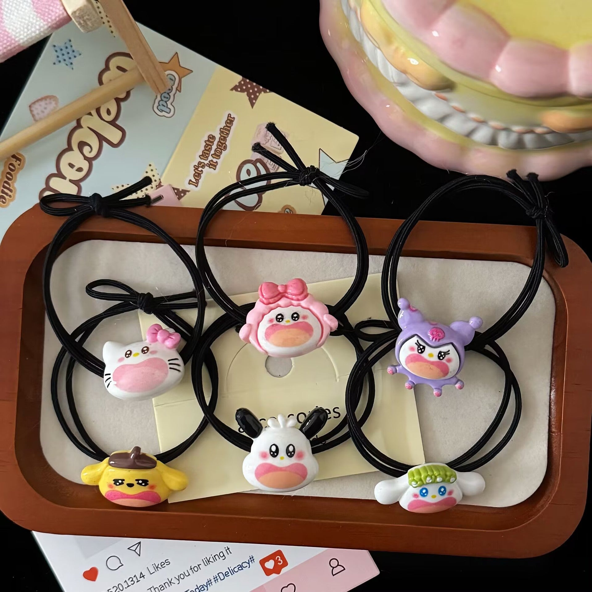 黑色貓咪髮圈－商品主圖｜https://igowo.tw/