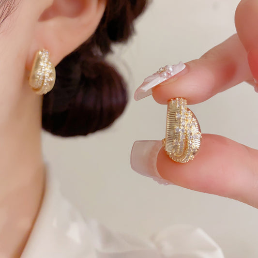 鋯石金屬交叉簡約耳釘－商品主圖｜https://igowo.tw/