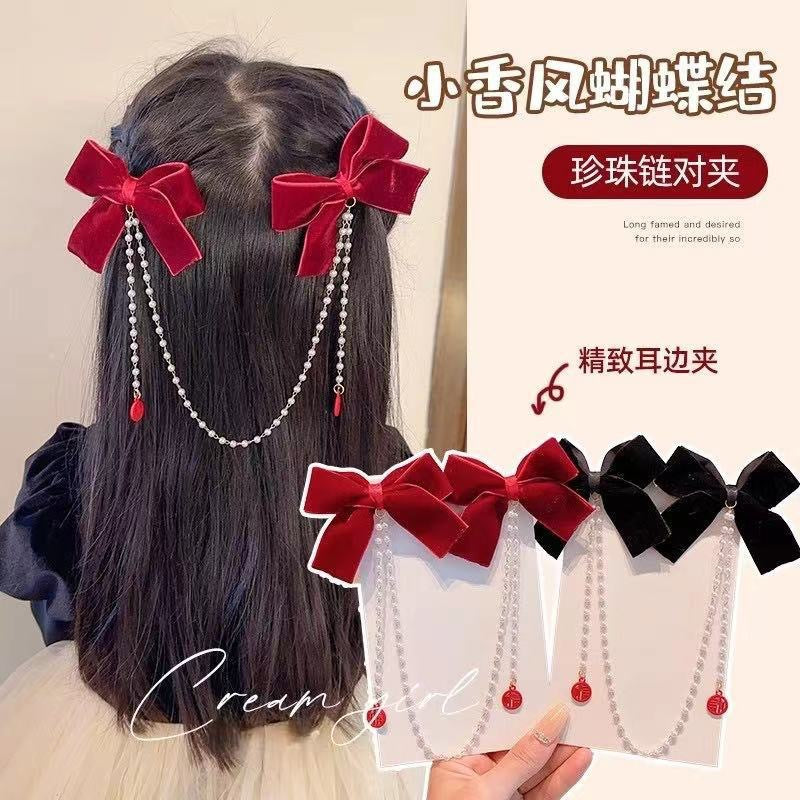 珍珠蝴蝶結流蘇髮夾－商品主圖｜https://igowo.tw/