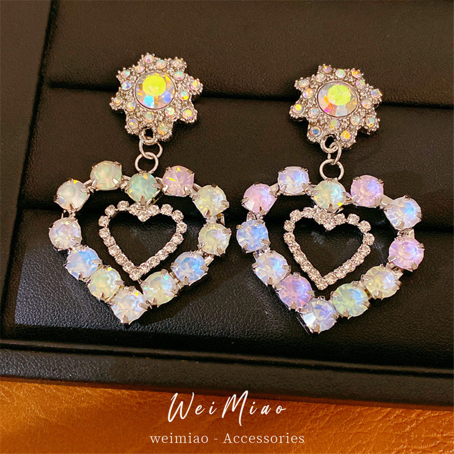 銀針愛心花朵鏤空耳環－商品主圖｜https://igowo.tw/