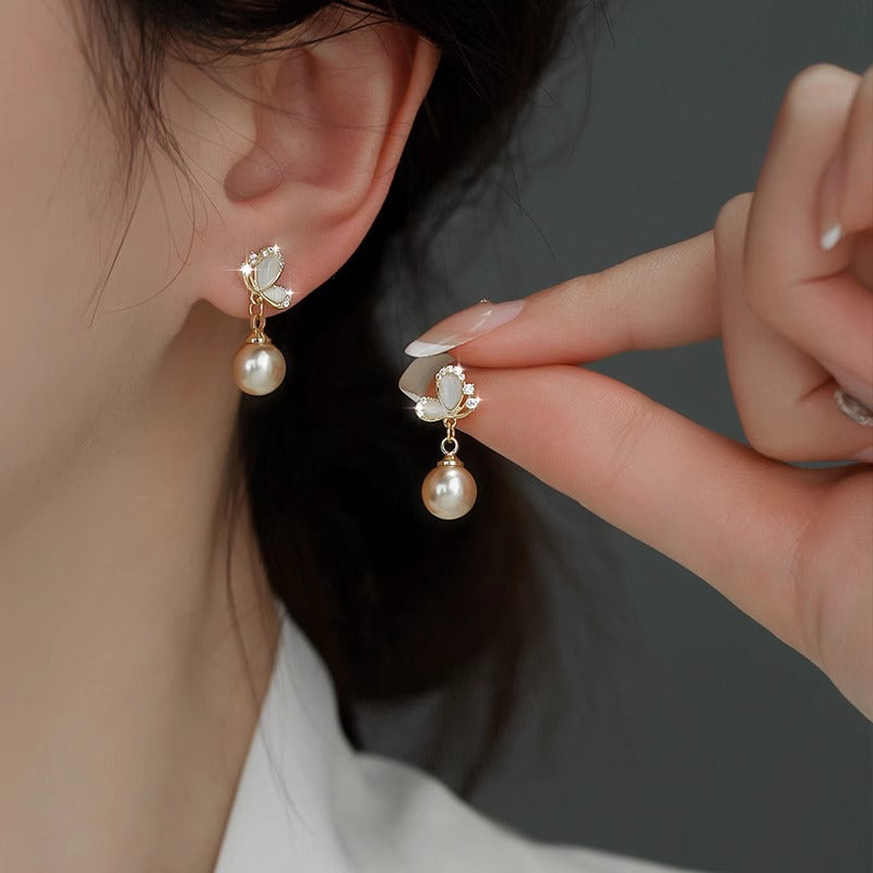 珍珠貓眼石蝴蝶耳環－商品主圖｜https://igowo.tw/