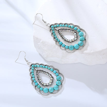 綠松石水滴鏤空耳環－粉色款細節1｜https://igowo.tw/