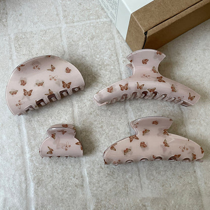棕色蝴蝶鯊魚夾－奶茶色衣架款細節｜https://igowo.tw/