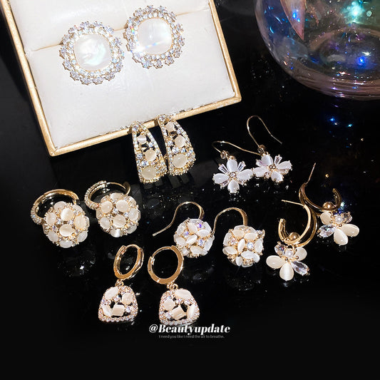 貓眼石花朵復古耳環－商品主圖｜https://igowo.tw/
