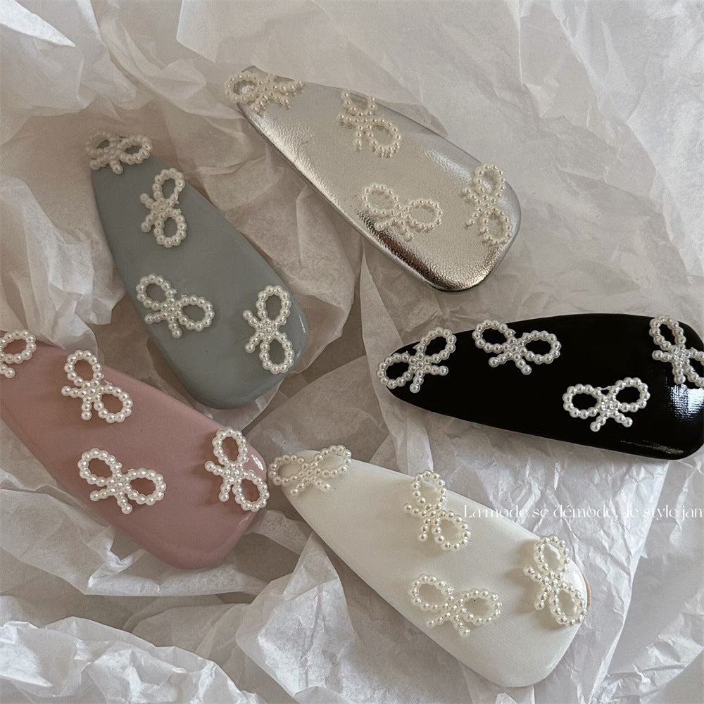 珍珠皮革蝴蝶結髮夾－商品主圖｜https://igowo.tw/