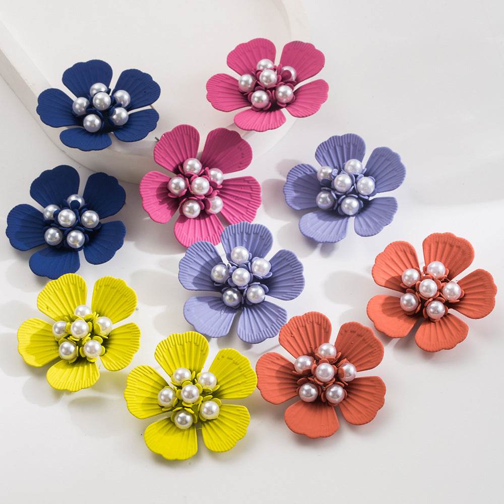珍珠金屬花朵耳釘－商品主圖｜https://igowo.tw/