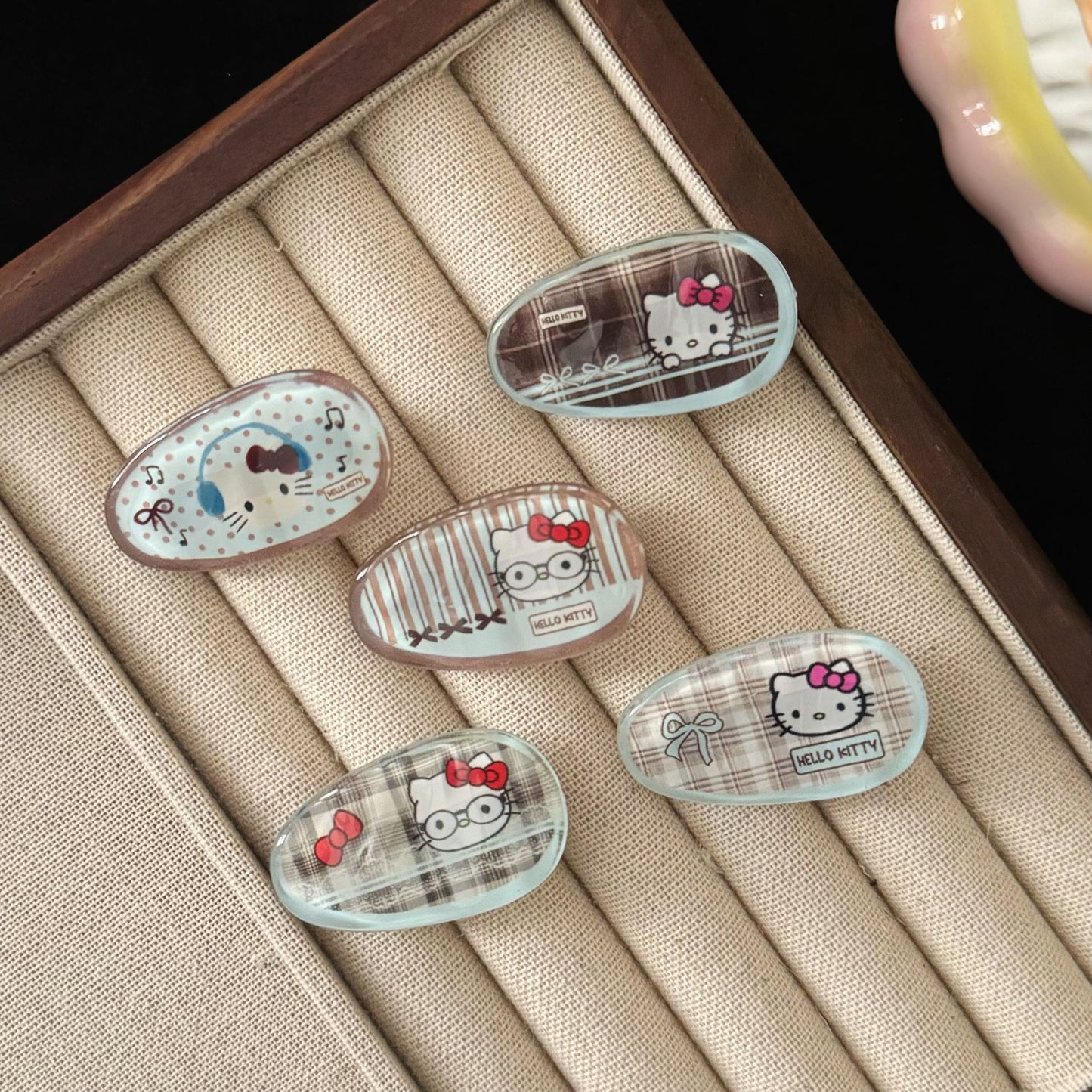 棕色貓咪橢圓簡約髮夾－商品主圖｜https://igowo.tw/
