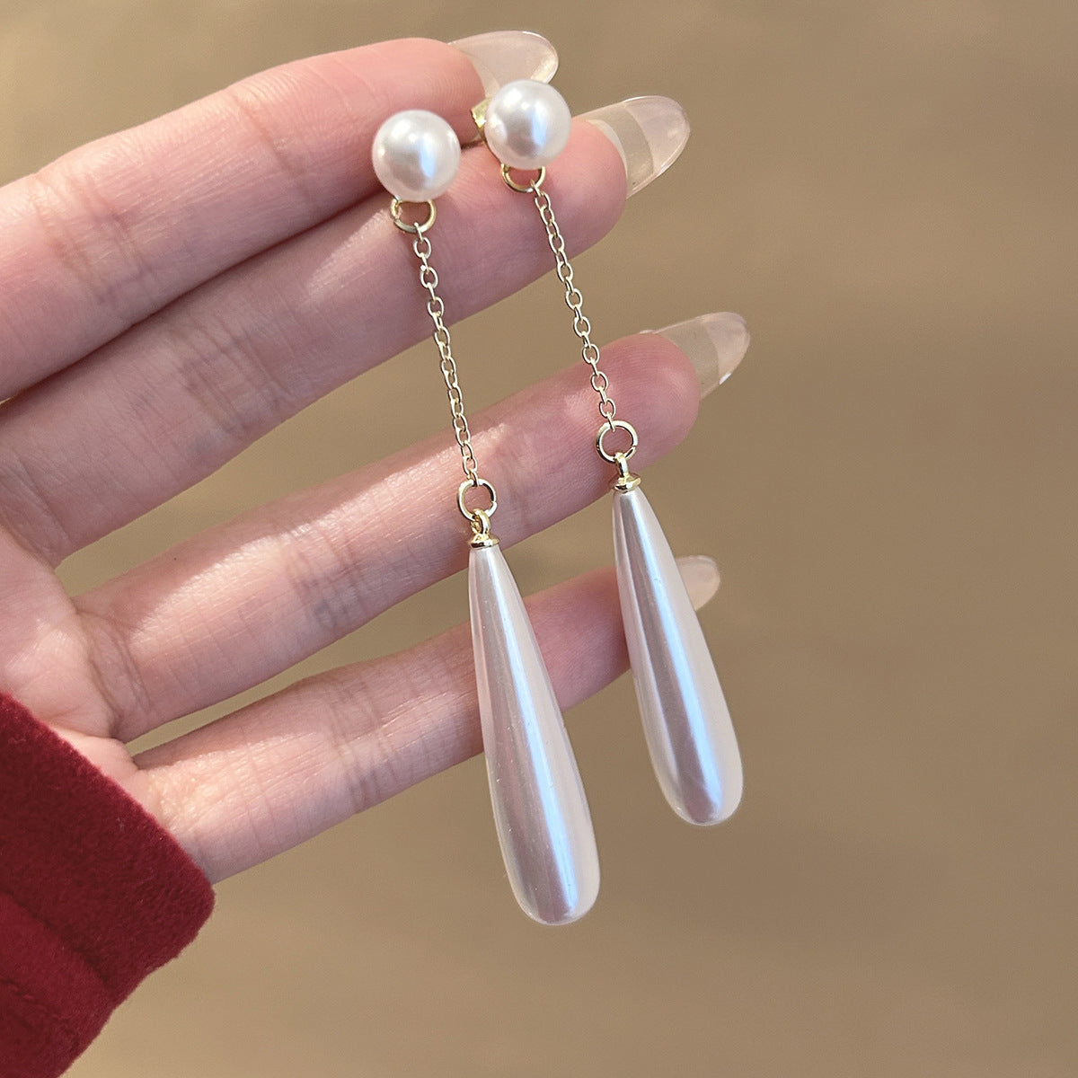 珍珠銀針水滴流蘇飾品－4/銀色光滑流蘇款細節｜https://igowo.tw/