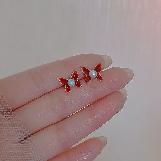 復古紅蝴蝶耳釘－商品主圖｜https://igowo.tw/