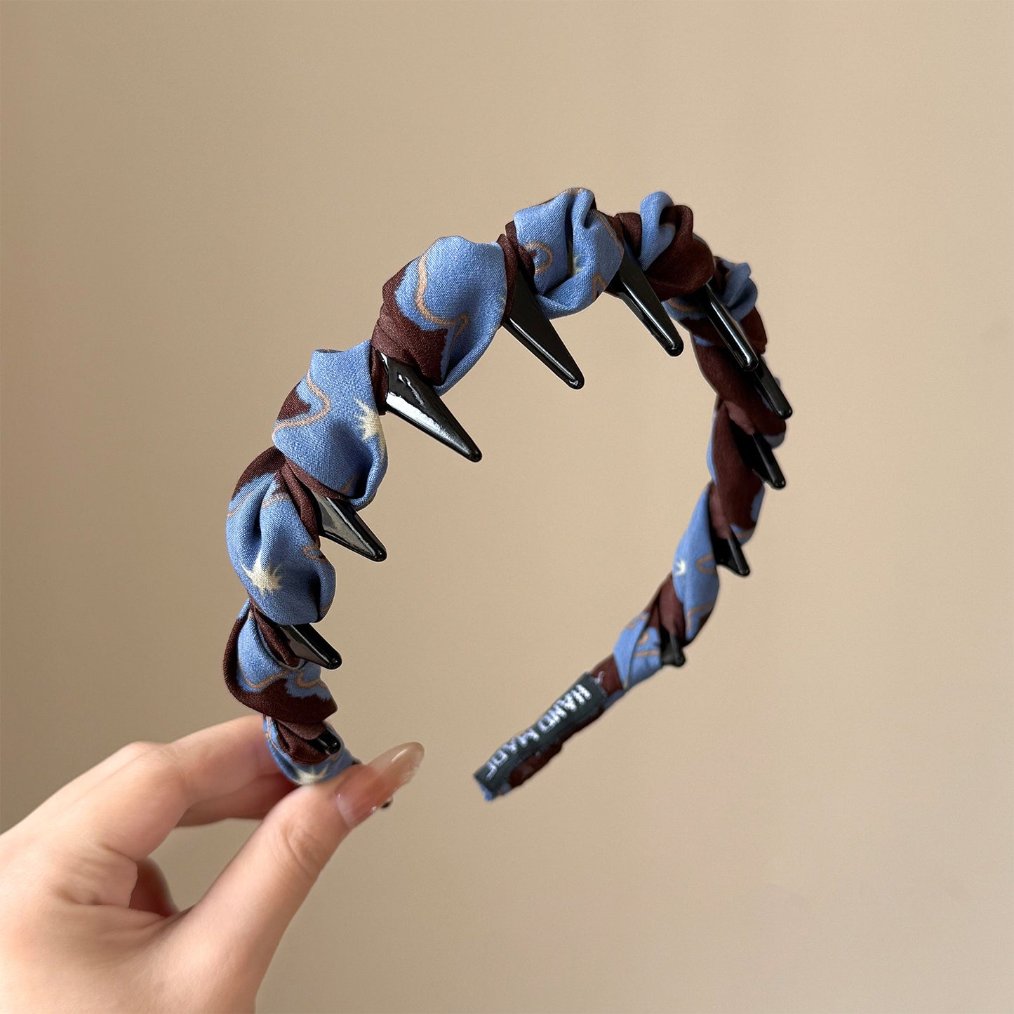 棕色纏繞髮箍－商品主圖｜https://igowo.tw/