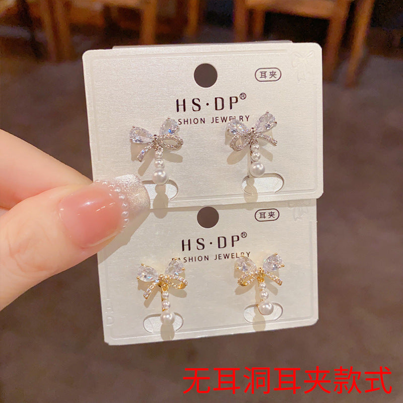 珍珠蝴蝶結簡約耳夾－商品主圖｜https://igowo.tw/