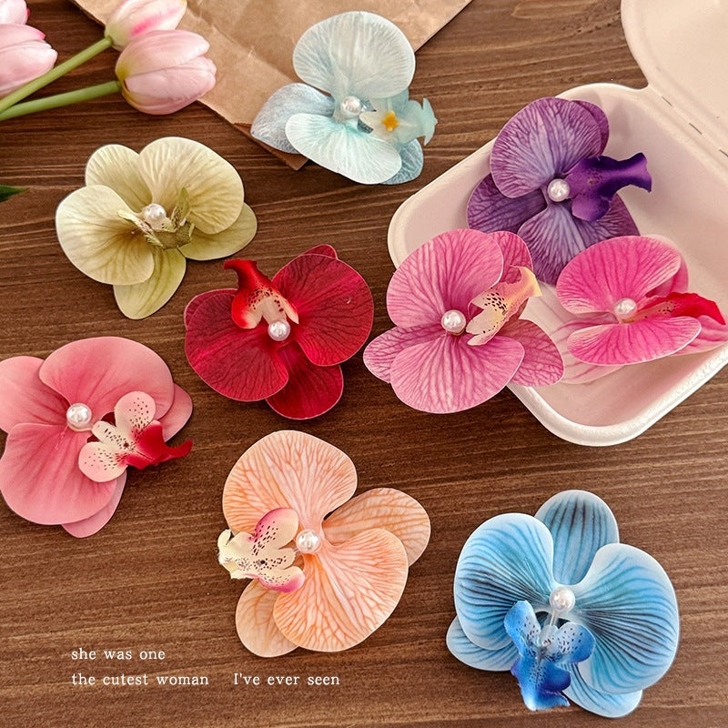 粉色蝴蝶花朵髮夾－商品主圖｜https://igowo.tw/