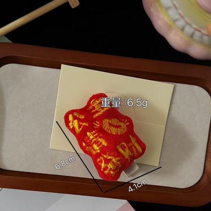 紅色絨面文字髮夾