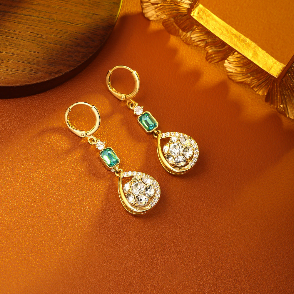 金色鋯石耳環－商品主圖｜https://igowo.tw/