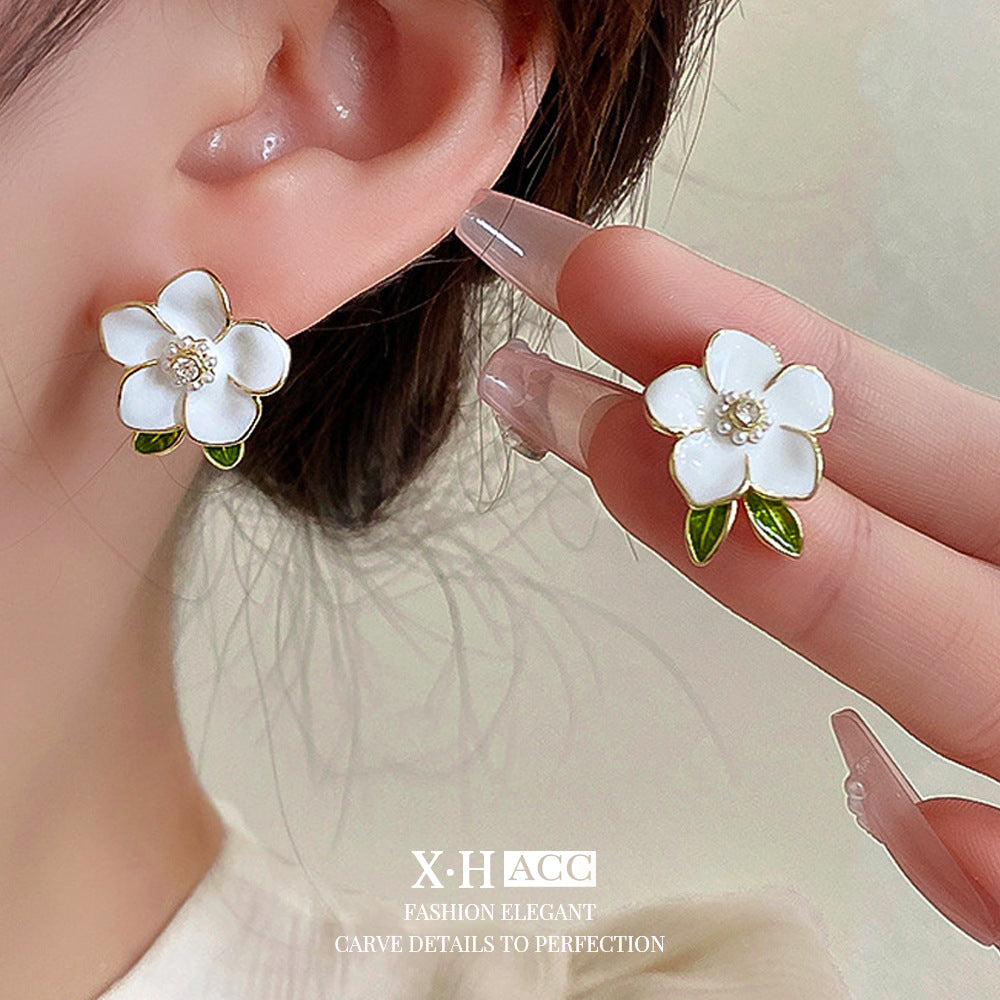 蝴蝶結花朵耳環－第二視角實拍｜https://igowo.tw/