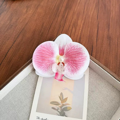 粉色蝴蝶花朵髮夾