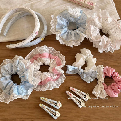 蕾絲波點蝴蝶結髮圈－商品主圖｜https://igowo.tw/