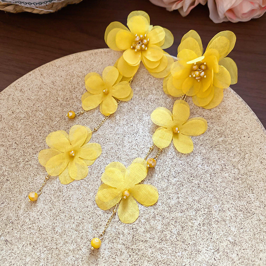 黃色蝴蝶花朵流蘇耳環－細節特寫35｜https://igowo.tw/