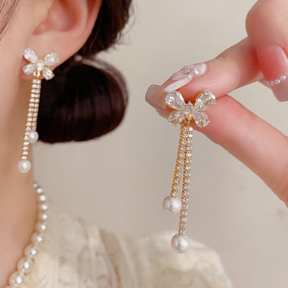 珍珠鋯石蝴蝶流蘇耳環－商品主圖｜https://igowo.tw/