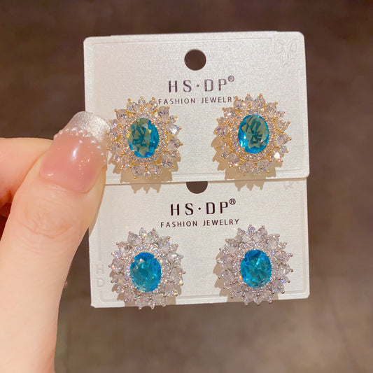 鋯石太陽花誇張耳釘－商品主圖｜https://igowo.tw/