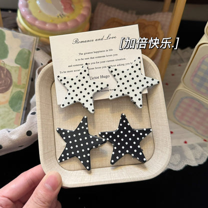 黑色金屬波點簡約髮夾－白色星星髮夾款實拍｜https://igowo.tw/