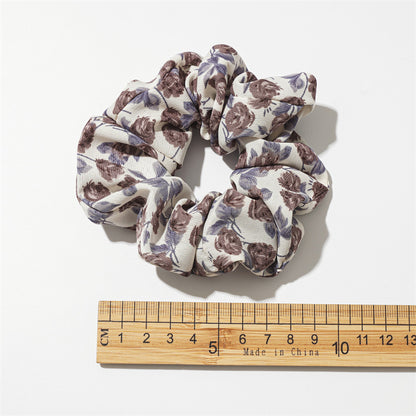 布面玫瑰大腸圈髮圈－玫瑰花黑色髮圈款細節｜https://igowo.tw/