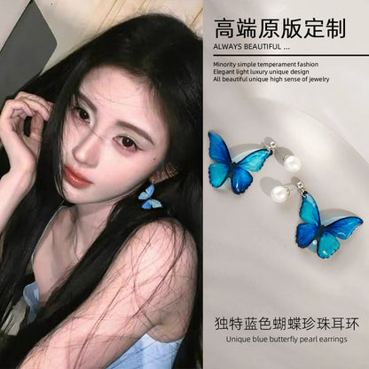 漸層珍珠蝴蝶耳釘－商品主圖｜https://igowo.tw/