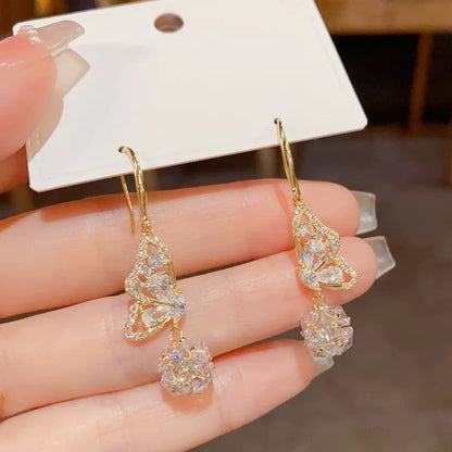 鋯石蝴蝶流蘇微鑲耳鉤－商品主圖｜https://igowo.tw/