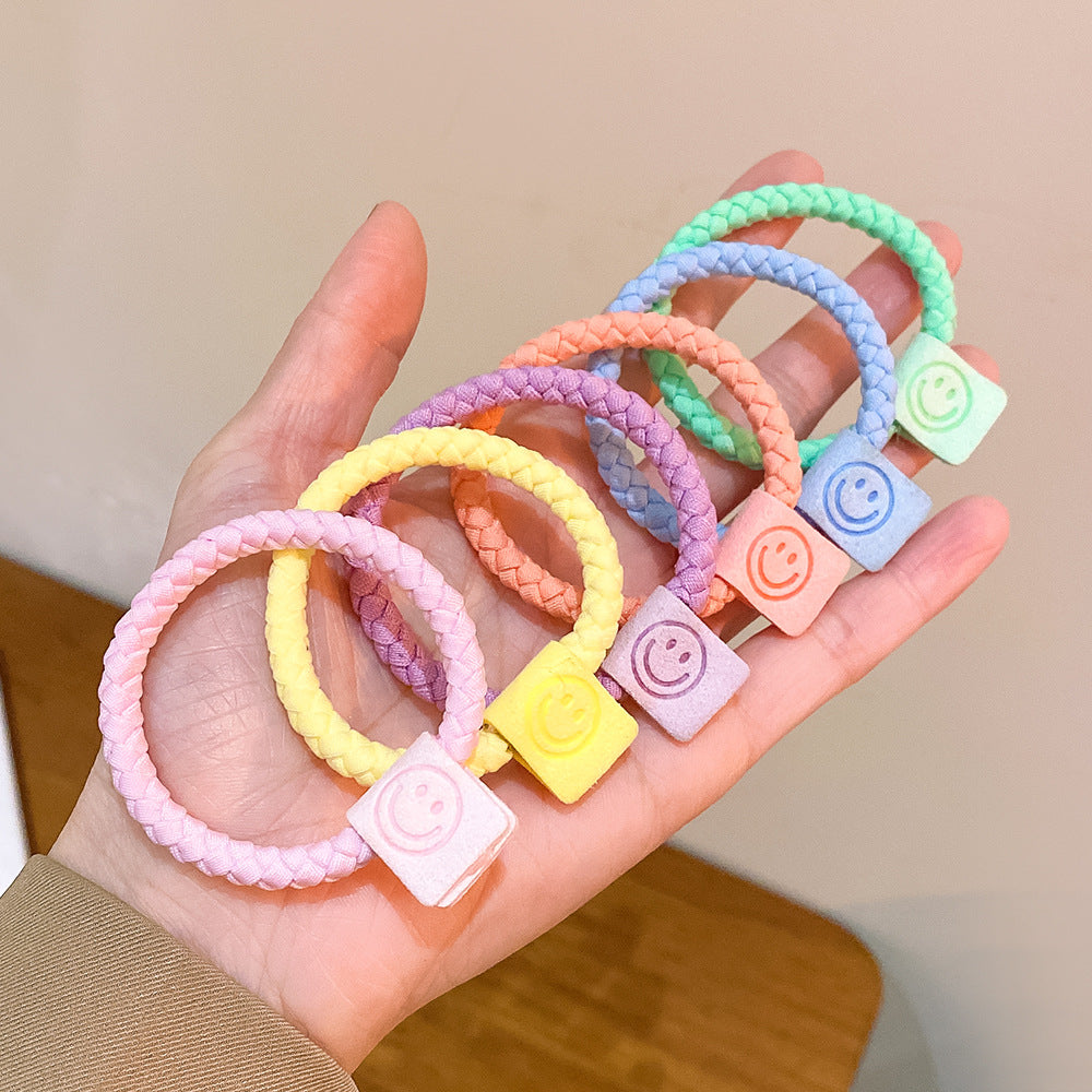 繽紛彈力繩笑臉髮圈－商品主圖｜https://igowo.tw/