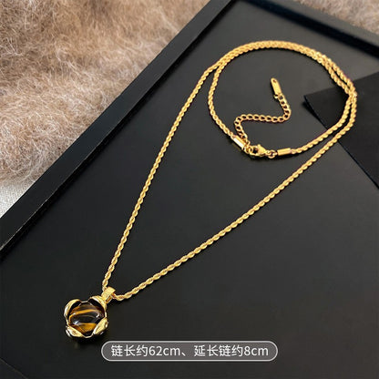 金色虎眼石墜飾項鍊－57#項鍊-玫瑰金-貝殼款細節｜https://igowo.tw/