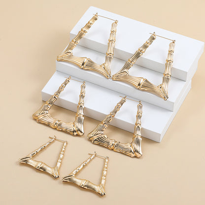 金色竹節誇張耳環－商品主圖｜https://igowo.tw/