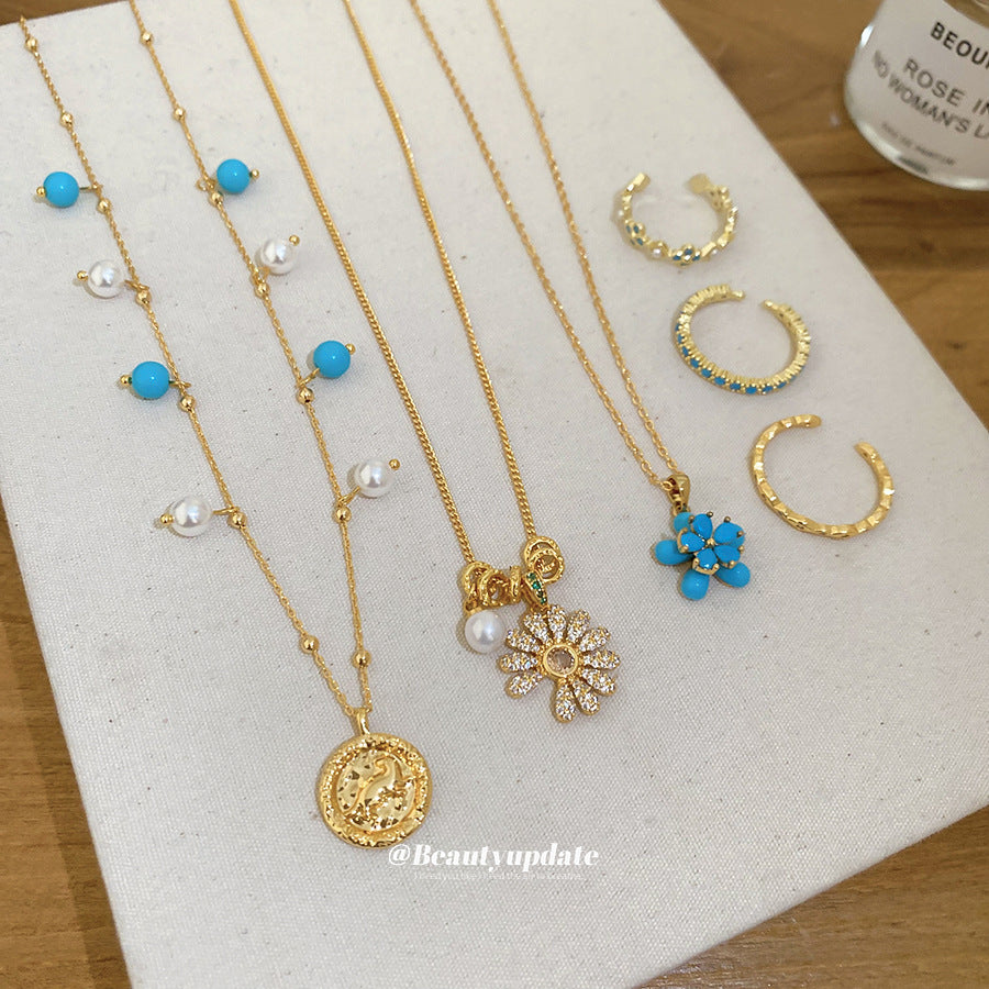 金色鋯石花朵墜飾項鍊－項鍊-環保-金色款細節｜https://igowo.tw/