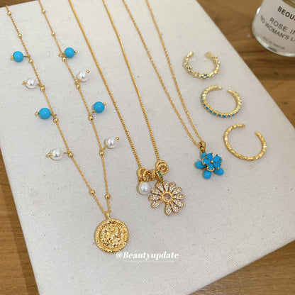 金色鋯石花朵墜飾項鍊－項鍊-環保-金色款細節｜https://igowo.tw/