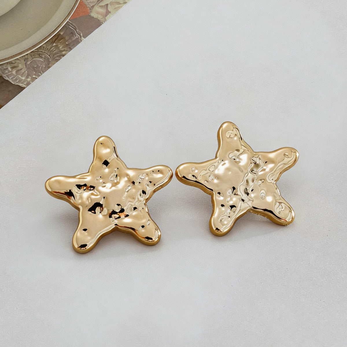 金屬海星花朵耳釘