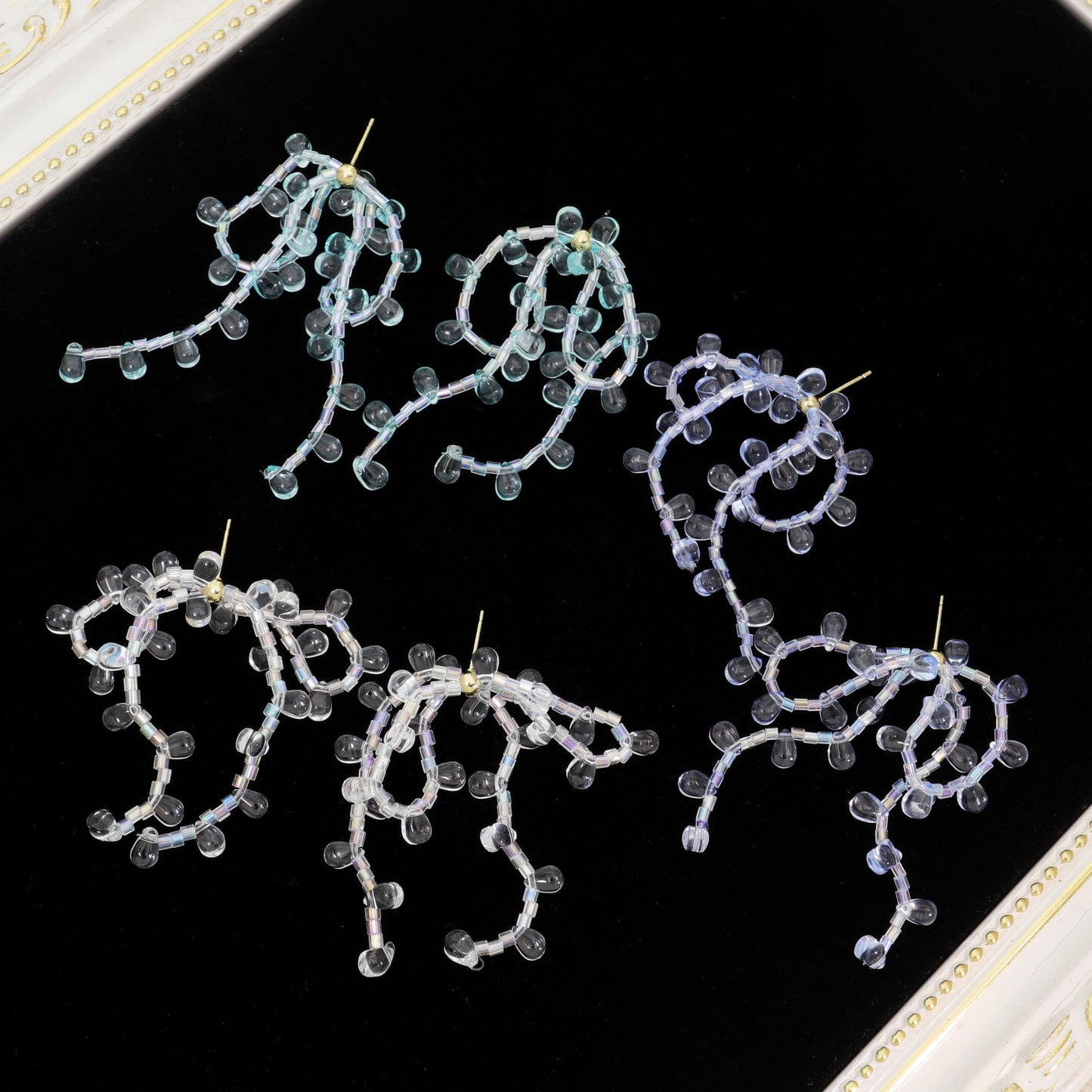 串珠銀針花朵流蘇耳環－商品主圖｜https://igowo.tw/
