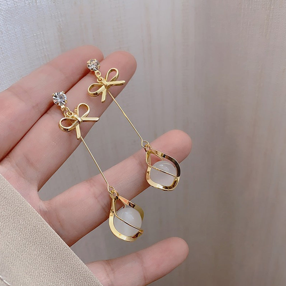 蝴蝶結花朵耳環－細節特寫67｜https://igowo.tw/